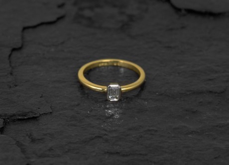 Gold & Platinum Ring set with trap cut Diamond by Steven Bourke, 2002